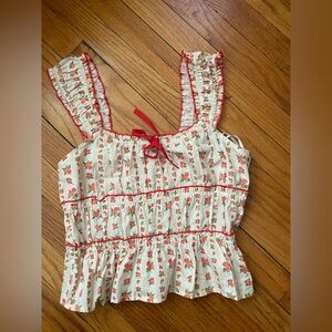 Floral Sleeveless Top with Red Accents